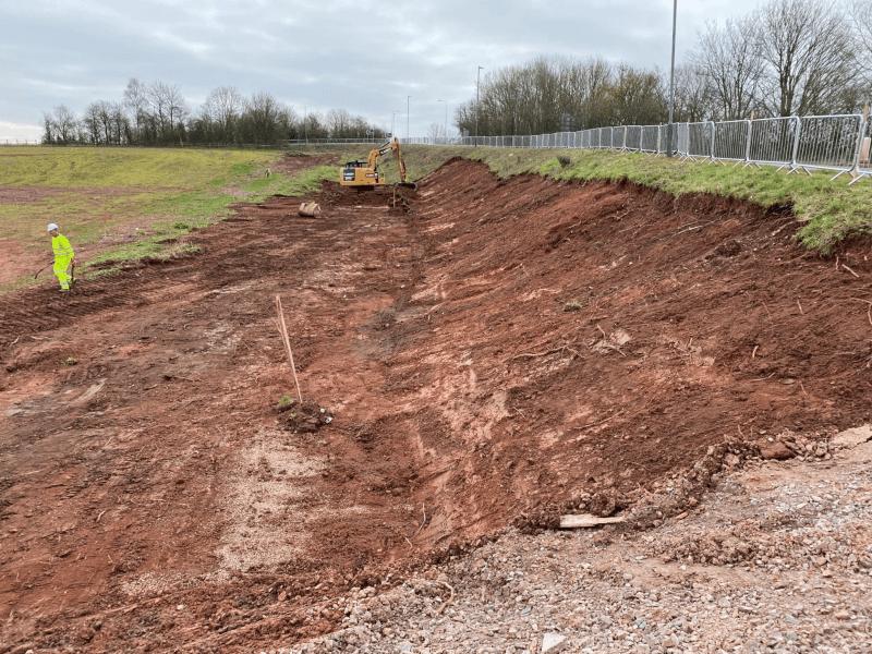 Efficient Topsoil Stripping with Deere Pull Pans